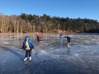 the boys and friends on glassy ice at Fawn Lake