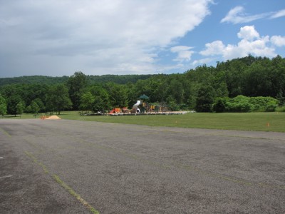 a view of the playground accross the parking lot