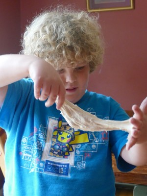 Harvey playing with sticky bread dough