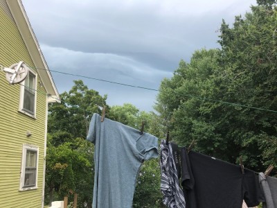 storm clouds behind the laundry on the line