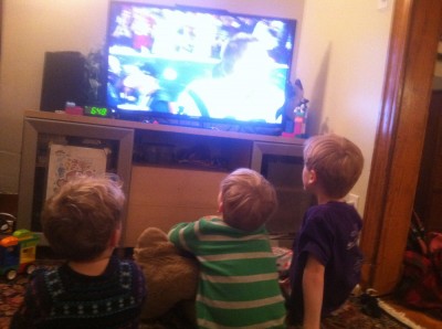 Lijah, Zion, and Nathan watching the Superbowl on tv