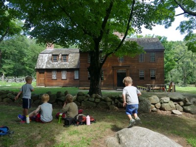 the boys eating lunch in front of Hartwell Tavern
