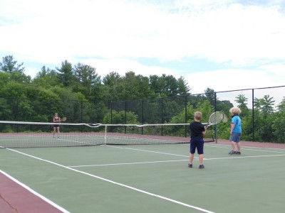 Leah playing tennis with Harvey and Zion