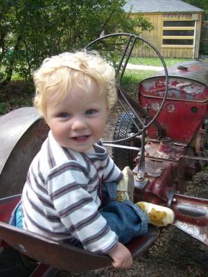 harvey on a tractor at drumlin farms