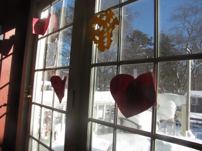 Valentine cards and snowflakes on our back door
