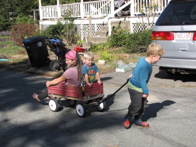 Harvey pulling Mama and Zion in the wagon.. he's working hard!