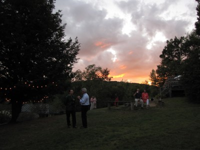 the sunset over the wedding reception
