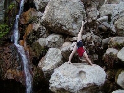 Leah does some yoga by a waterfall