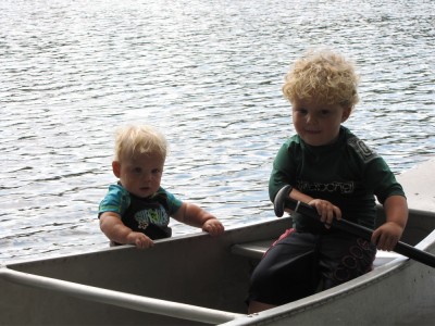 Harvey in the canoe, Zion pushing it