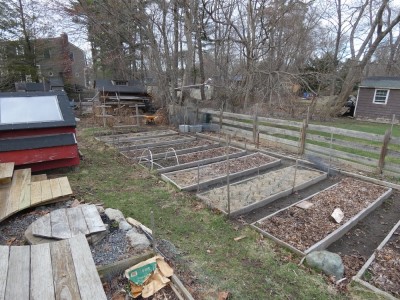 the garden at the beginning of the season, with most beds empty