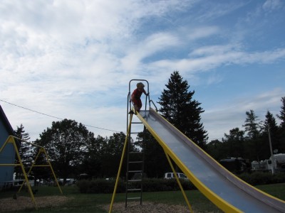 Harvey at the top of a tall metal slide