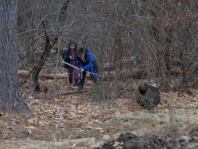 Zion and Jack hunting in the woods