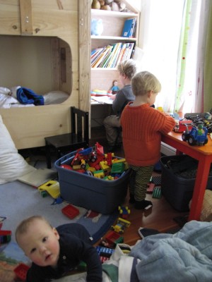 Lijah, Zion, and Harvey playing in their bedroom