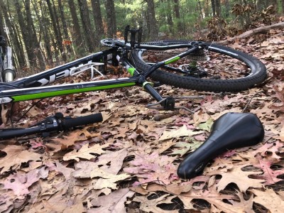 my bike lying on the ground with the saddle unattached