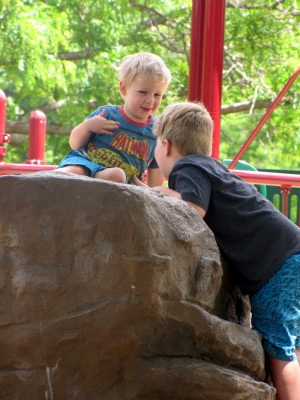 Zion and Harvey chatting at a playground