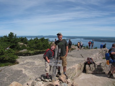 Harvey and me posing by the sign on Champlain Mtn, with lots of other people around