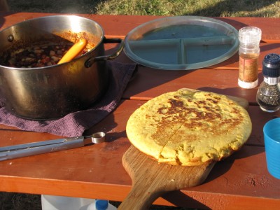 chili and cornbread cooked over the fire