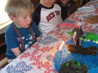 Zion blowing out the candles