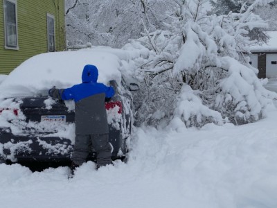 Harvey clearing Mama's car of snow