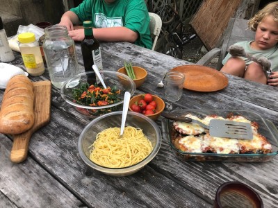 spaghetti and eggplan parmesan on the picnic table