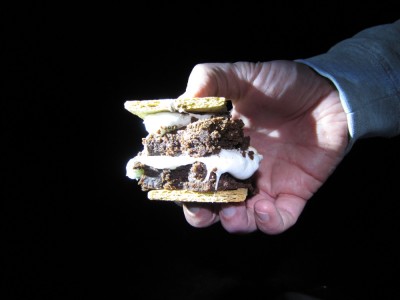 a smore Tim made with a giant marshmallow, graham crackers, and a brownie