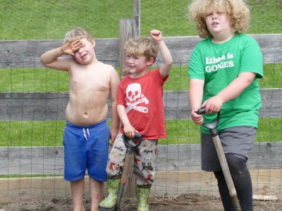 the boys looking worn out from digging