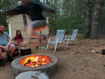 me blurily jumping over a fire