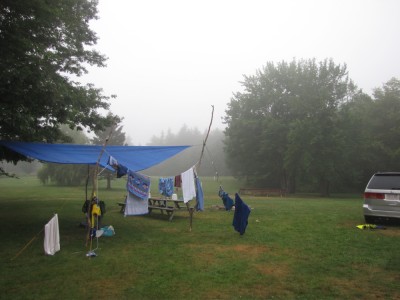 the tarp shelter Andrew built, standing proud in the fog