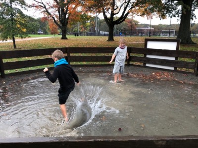 Elijah and Zion playing in a flooded gagaball pit