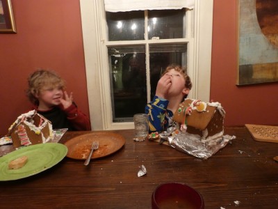 Zion and Elijah eating their gingerbread houses