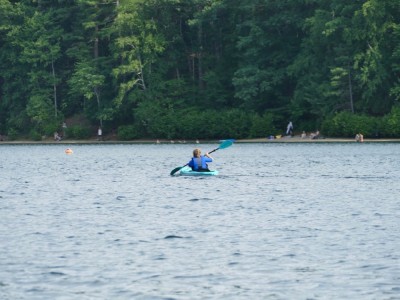 Harvey paddling in his own kayak