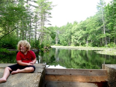 Harvey sitting on a dam at Great Brook Farm