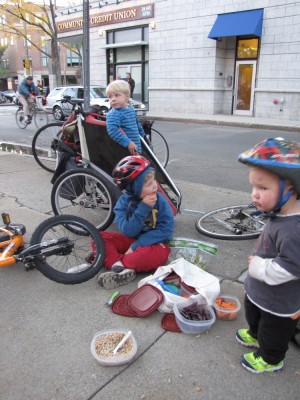 the boys on the sidewalk with their tupperware supper