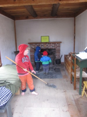 the boys playing in the Thoreau house; Harvey sweeping