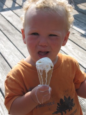 Lijah holding a melting ice cream cone