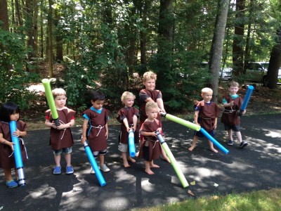 the boys among many others dressed up as Jedi knights, lined up with foam light-sabers