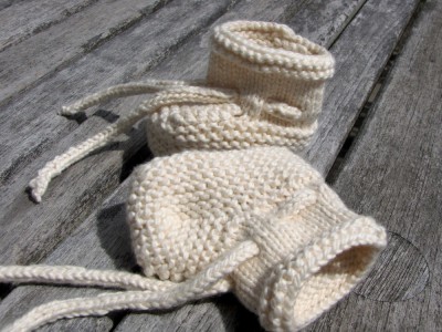 white knitted booties