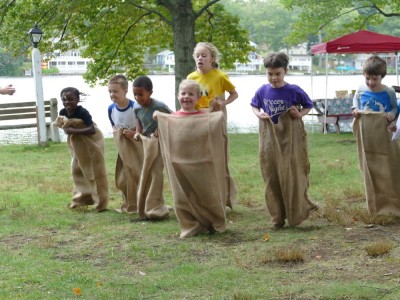 Zion in the midst of a sack race by a lake