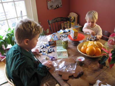 Harvey and zion building legos at the kitchen table