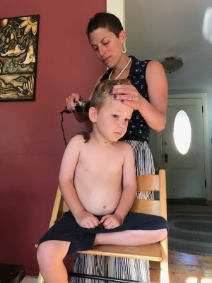 Mama giving Lijah a haircut
