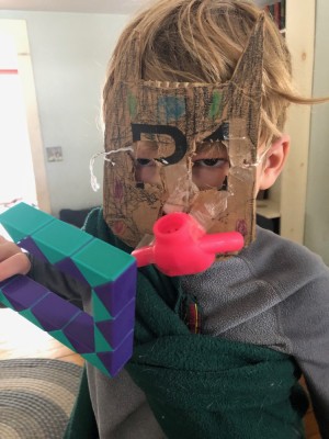 Elijah in a cardboard mask