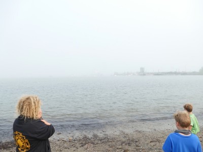 the boys watching the ferry in the fog at Lincolnville Beach
