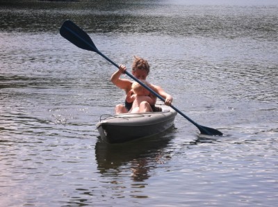 Mama and naked Zion in the kayak