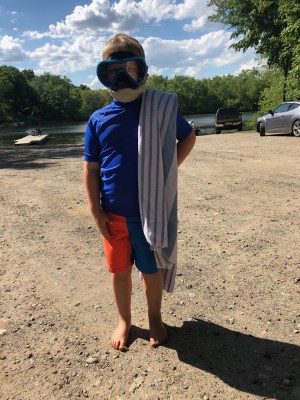 Zion wearing his face mask and swimming mask