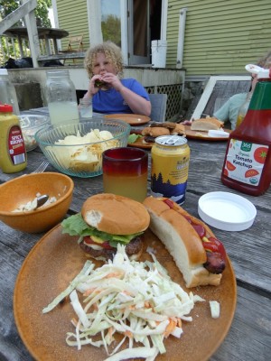 my plate with a hamburger and hot dog and cole slaw