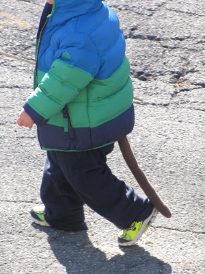 Lijah's tail poking out from under his winter coat