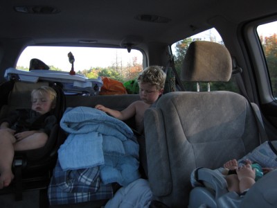 the boys cozy in the car