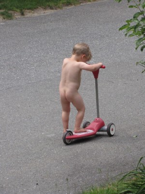 Lijah scootering naked in the street