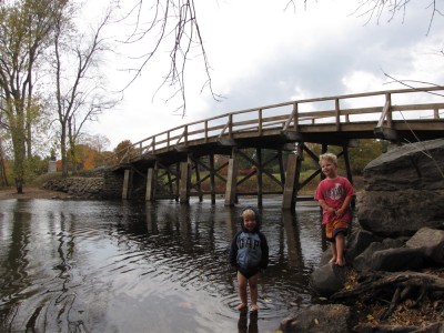 Harvey and Zion posing in front of the Old North Bridge