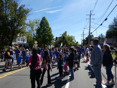 crowds of people in the street for the parade